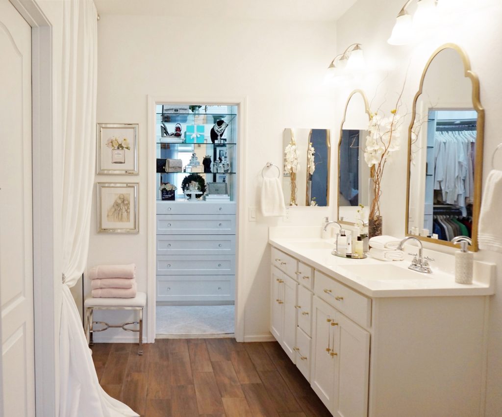 updated master bathroom with mixed metals