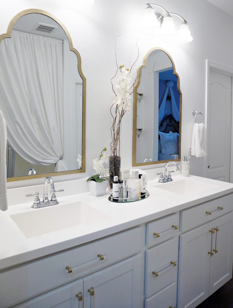 updated master bathroom with mixed metals