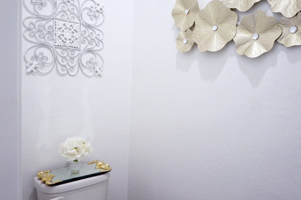 updated master bathroom with mixed metals