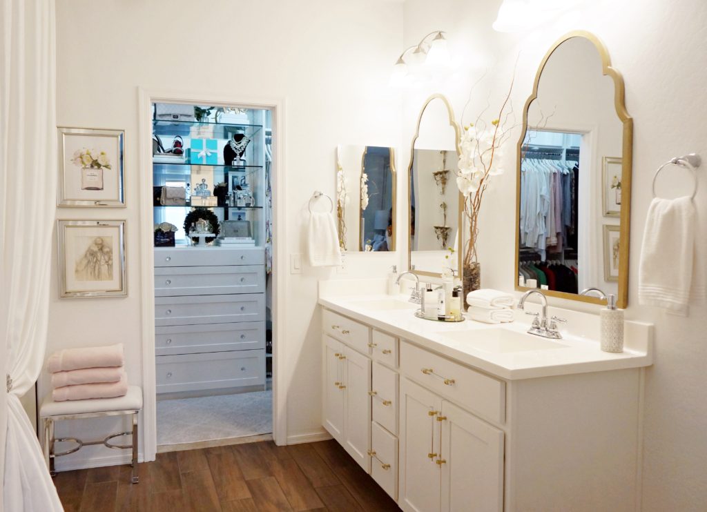 updated master bathroom with mixed metals