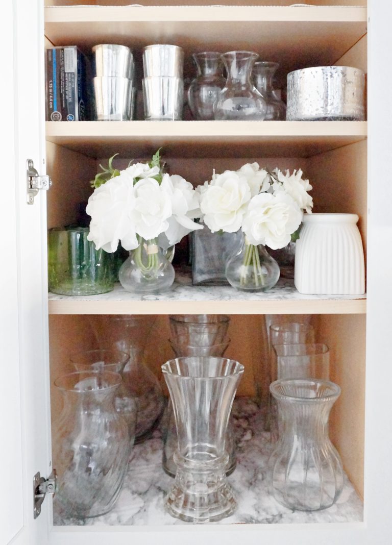 vase and candle cabinet organization